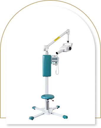 A modern dental X-ray machine with an adjustable arm and control panel. It features teal padding on the arm and base, set against a white background.